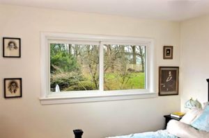 Interior of bedroom with white window