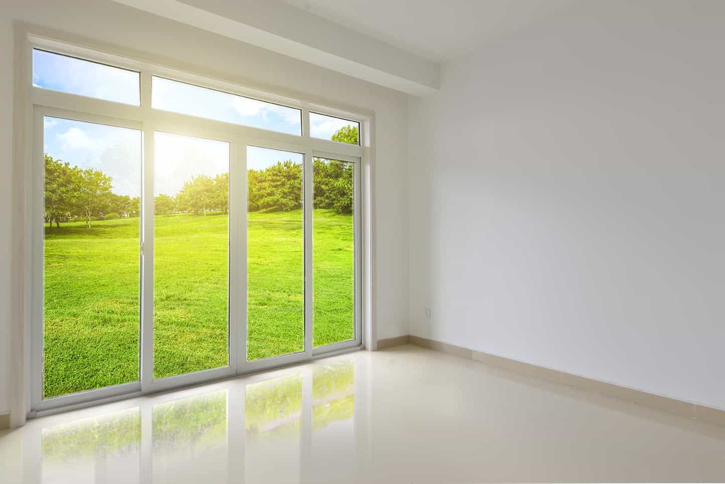 Transom windows growing above sliding doors